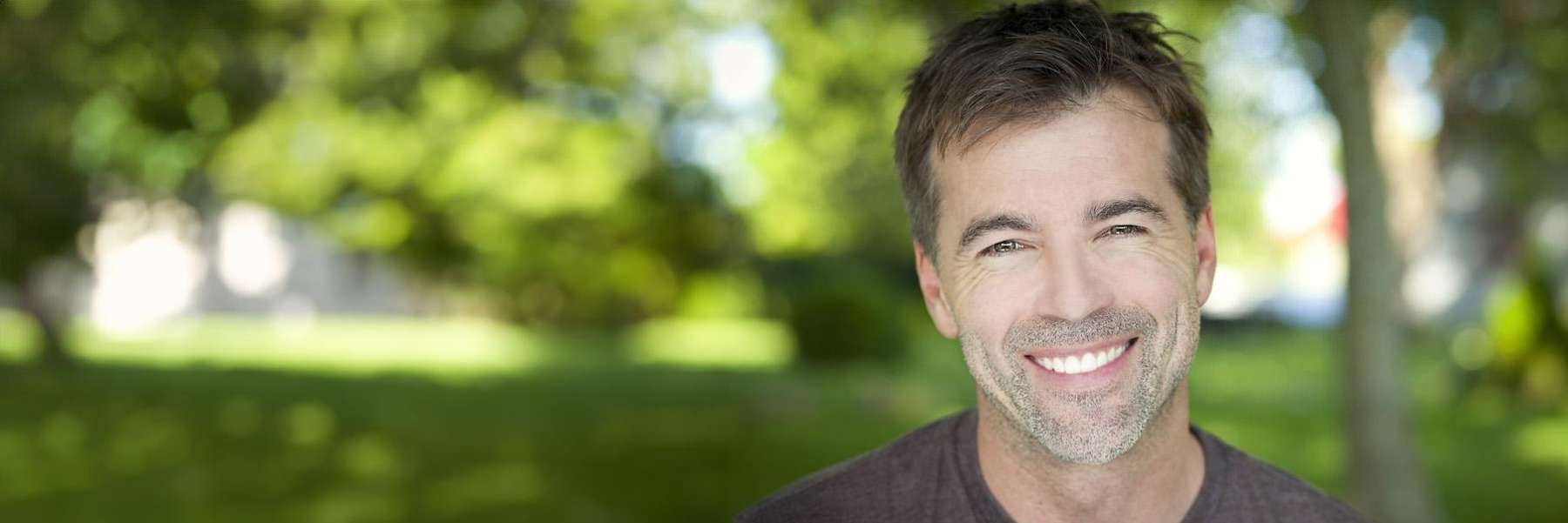 A man with dental implants in Greeley