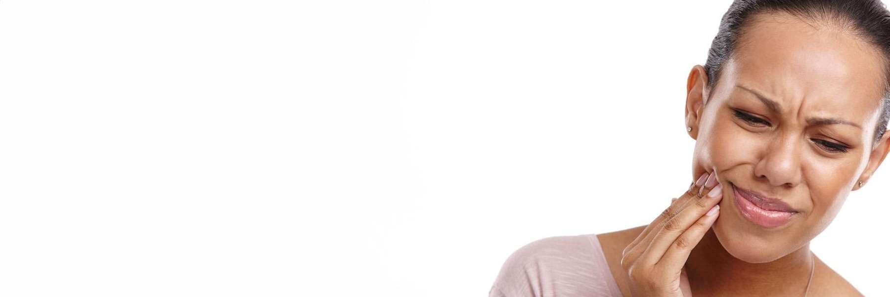 A woman having a dental emergency in Greeley