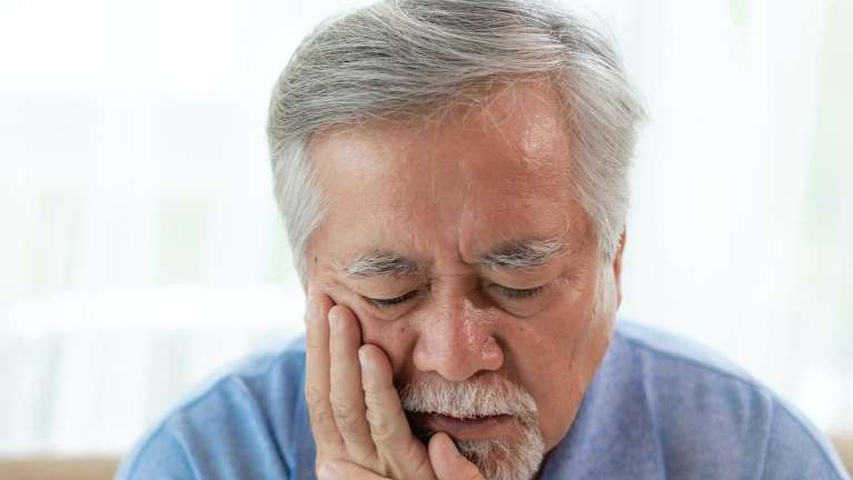 A man having a dental emergency in Greeley