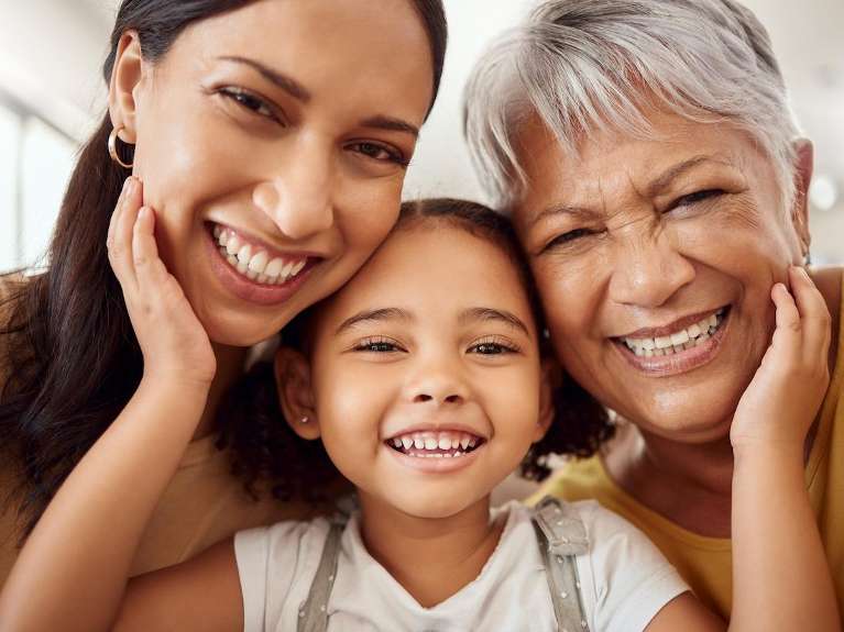 A laughing family | Greeley dentist