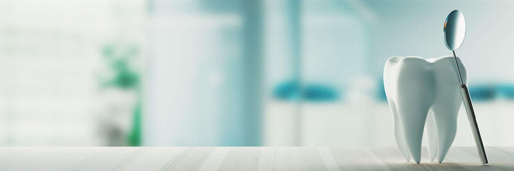 A tooth and dental mirror | Greeley dentist